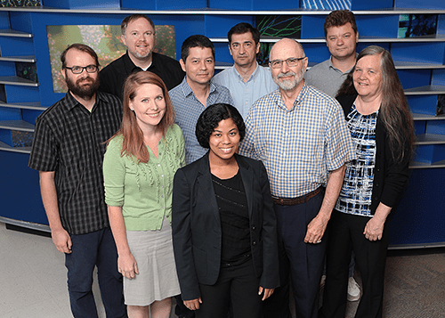 A photo of faculty members from the Center for Autoimmune Genomics and Etiology.